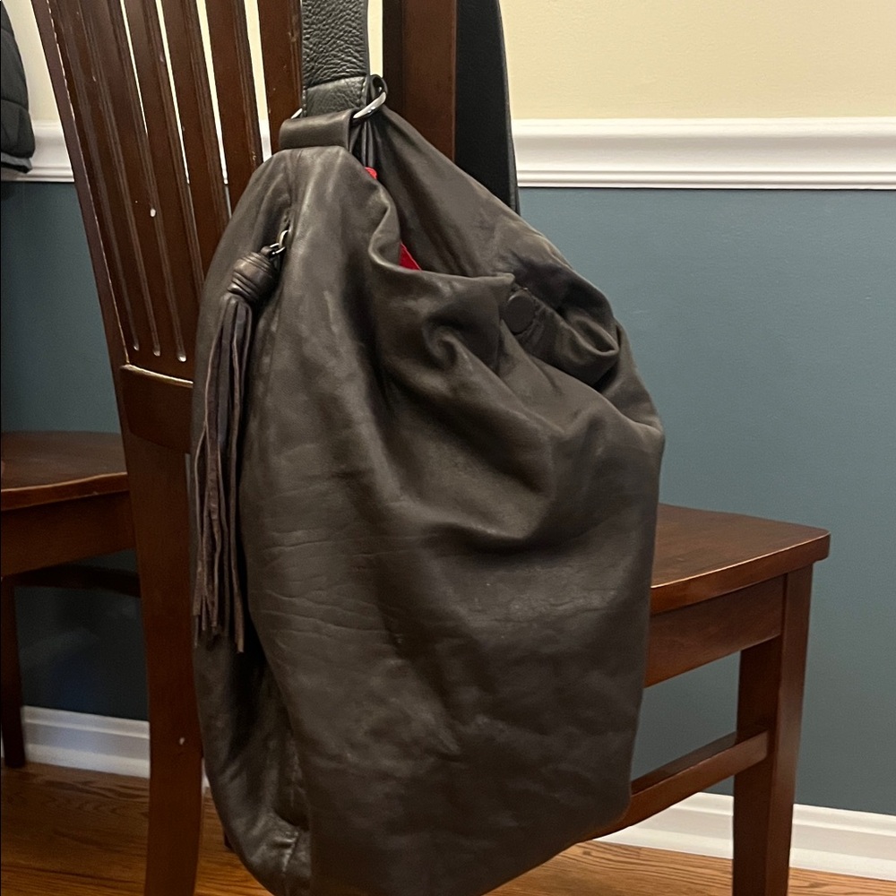 DanAzan slouchy one shoulder bag in brown leather with black adjustable strap